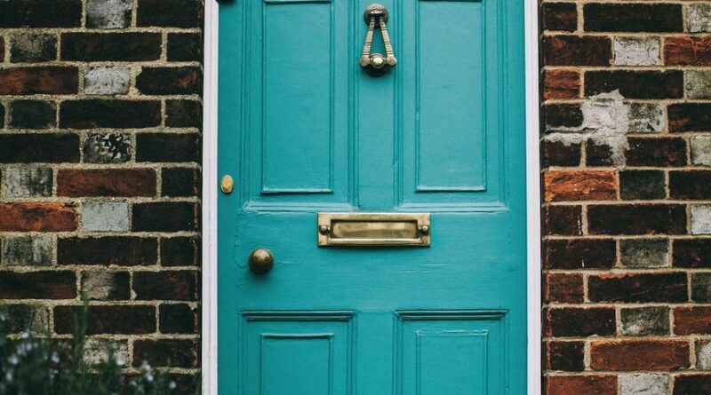 teal wooden panel door