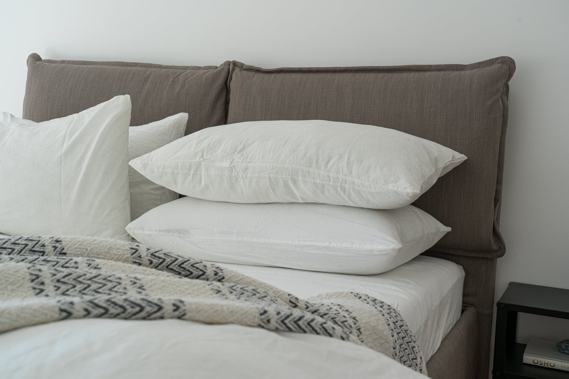 white pillows on a bed